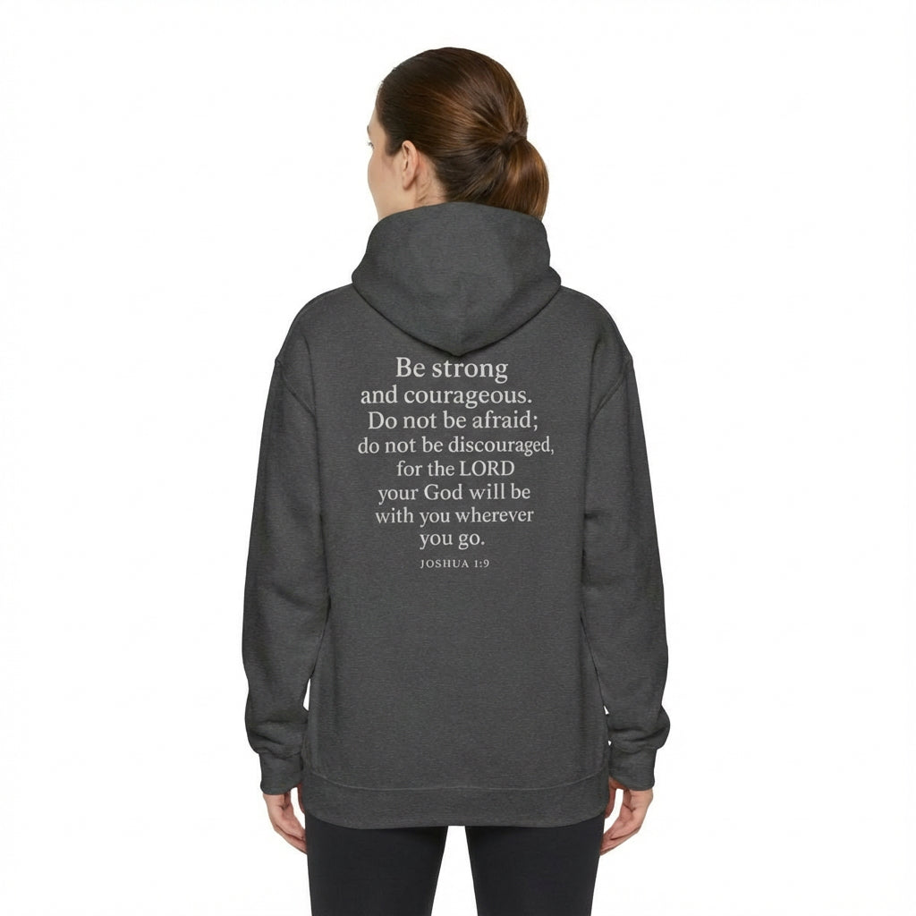 Model wearing dark gray Joshua 1:9 Christian hoodie, back view.