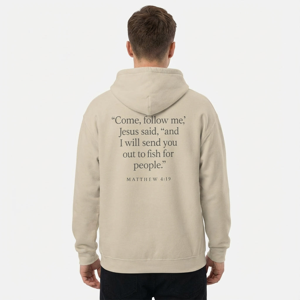 Model wearing sand Matthew 4:19 Christian hoodie with scripture graphic on the back.