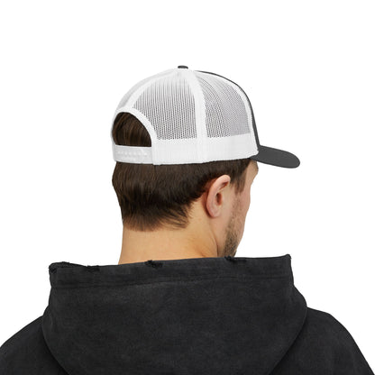 Back view of gray and white Rack & River Outdoors mesh trucker cap on model in black hoodie.