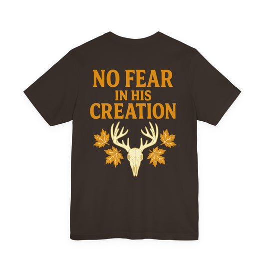 Brown ‘No Fear in His Creation’ Christian hunting t-shirt with yellow deer antler skull design, product mockup on white background.
