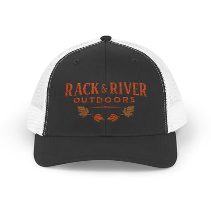 Christian outdoor trucker hat in gray and white with embroidered Rack & River Outdoors logo.”
“Rack & River Outdoors brown trucker cap with orange embroidered outdoor lifestyle logo.