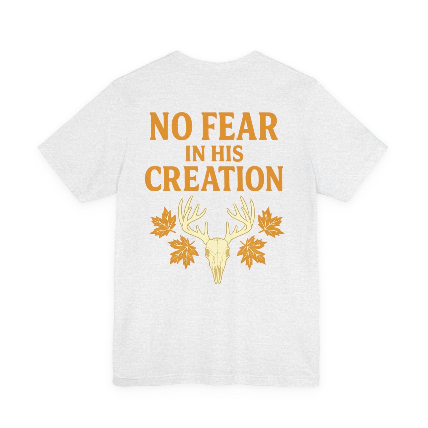 White ‘No Fear in His Creation’ Christian hunting t-shirt with yellow deer antler skull design, product mockup on white background.