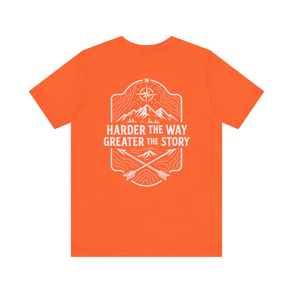 Orange Rack & River Outdoors t-shirt with ‘Harder the Way, Greater the Story’ mountain compass graphic on the back.