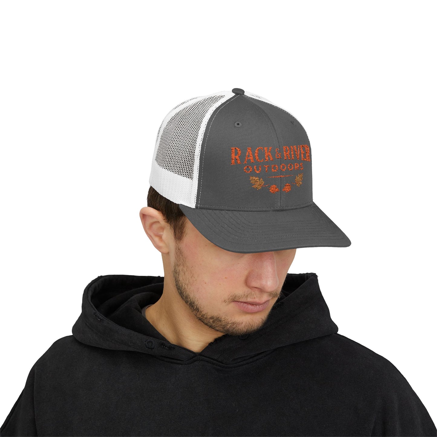 Male model in gray and white Rack & River Outdoors trucker cap with orange embroidered outdoor logo.
