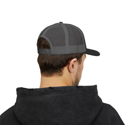 Back view of gray and black Rack & River Outdoors mesh trucker cap on model in black hoodie.