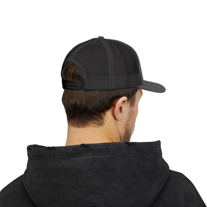 Back view of gray and black Rack & River Outdoors mesh trucker cap on model in black hoodie.