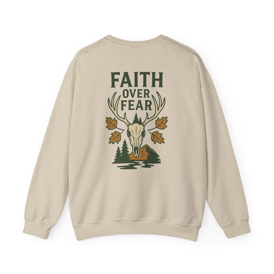 Tan Christian crewneck with ‘Faith Over Fear’ deer skull and fall leaves graphic, faith-based outdoor sweatshirt.