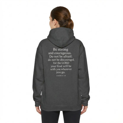 Model wearing dark gray Joshua 1:9 Christian hoodie, back view.