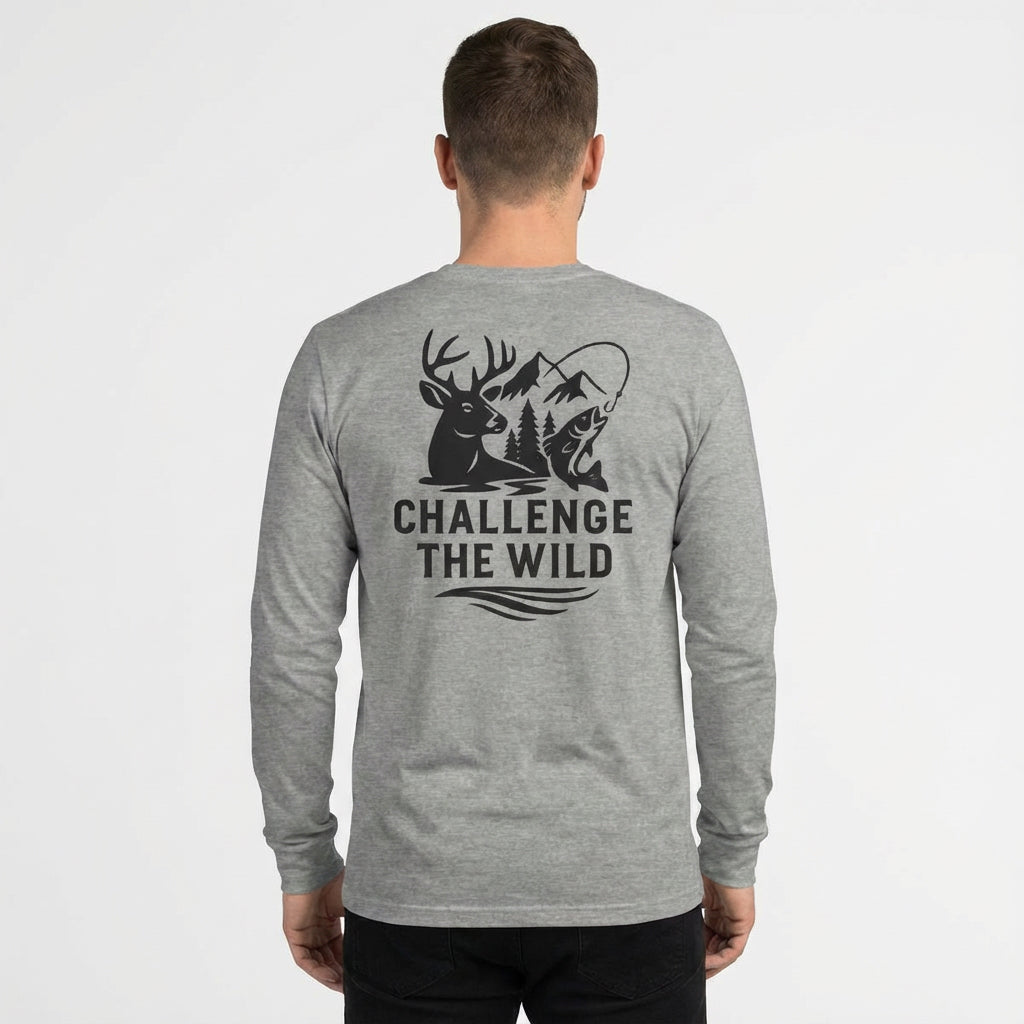 Back view of model wearing grey long sleeve shirt with large “Challenge the Wild” graphic.