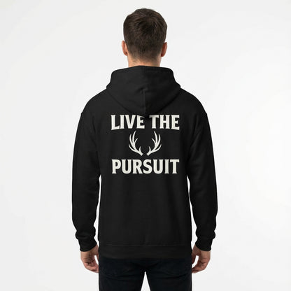 Man wearing black Christian hoodie with large ‘Live The Pursuit’ back graphic.